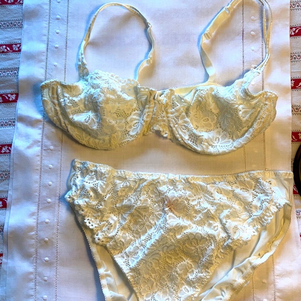 Shiny, lacy bra and panties by Triumph